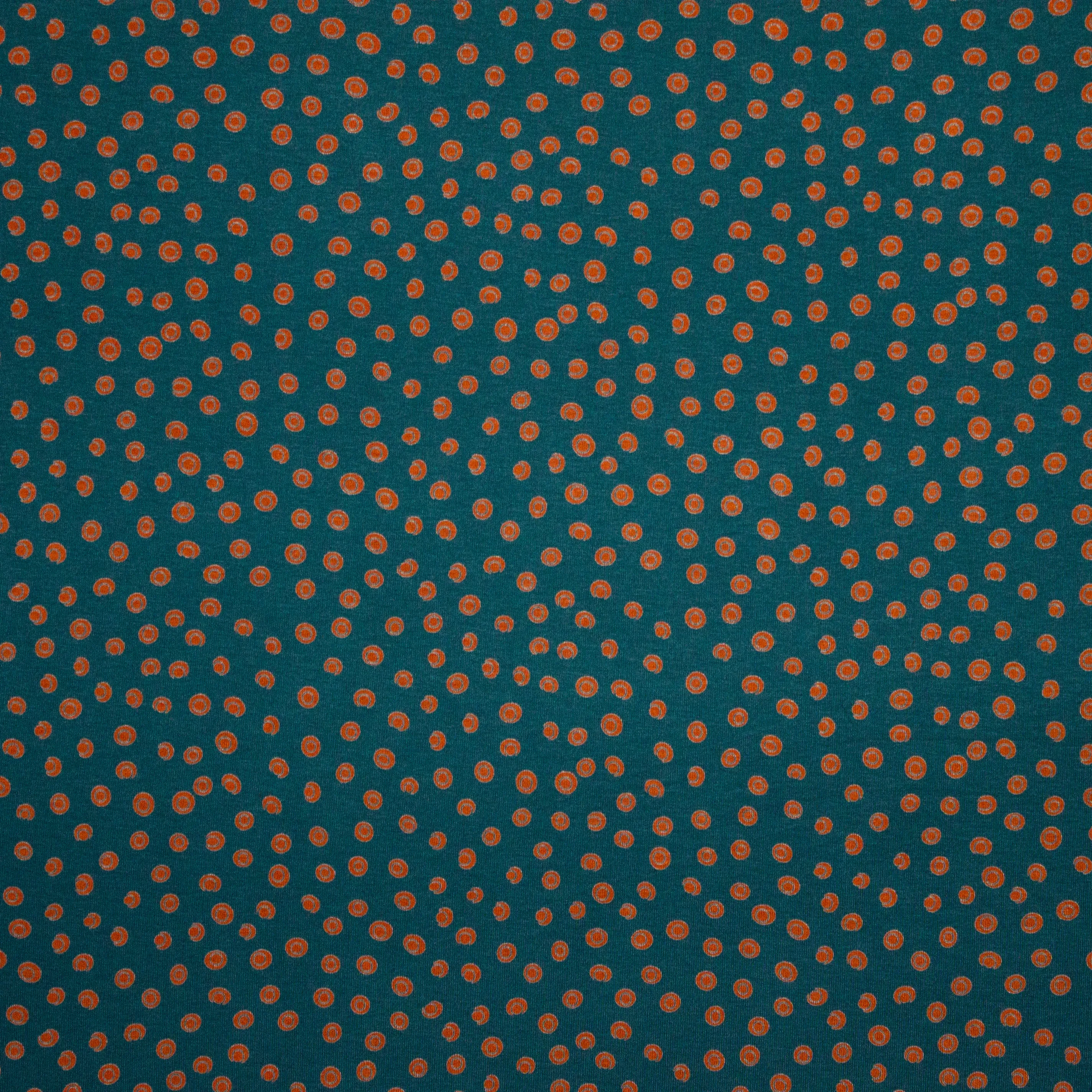 Petrol viscose tricot met rode stippen